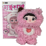 A Nommi Loveliness Never Ends Plush blind box figure with a smooth face wearing a fluffy pink bear suit with a red heart on the chest, displayed in front of its illustrated product box.