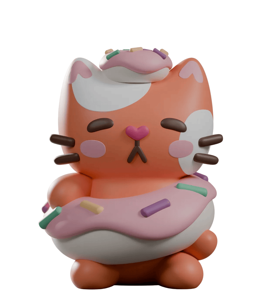 A stylized orange and white cat figurine with donut-themed details, inspired by bakery cats from the Kaleidos Creative Bake Me A Cat Blind Box collection.