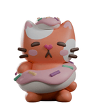 A stylized orange and white cat figurine with donut-themed details, inspired by bakery cats from the Kaleidos Creative Bake Me A Cat Blind Box collection.