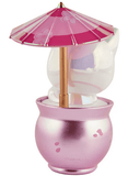 The Tokidoki Cherry Blossom Cats - Special Edition Blossom Kitty features a white cat figurine with a pink and red umbrella, seated in a metallic pink pot adorned with small paw prints.