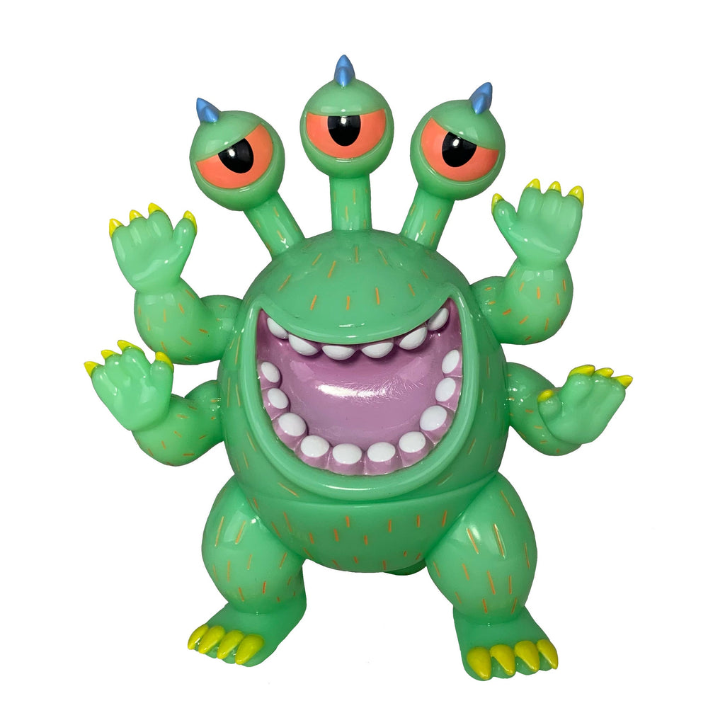 Dinosuke Green by Paradise Toy (TW) is a green vinyl cartoon monster figure with three eye stalks, four arms, and a wide open mouth displaying white teeth.