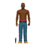A plastic figurine of a bald, muscular man representing hip-hop legend DMX, wearing a chain necklace, blue pants, yellow shoes, and holding a microphone from Super 7's DMX ReAction - It's Dark And Hell Is Hot collection.