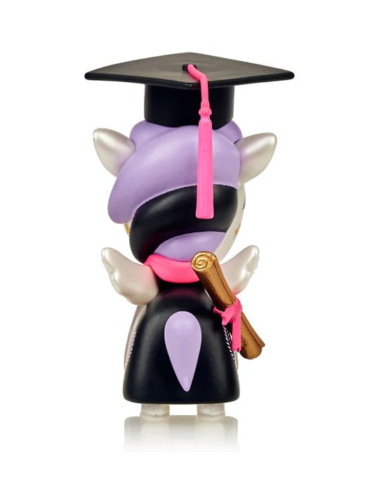 A Graduation Unicorno by tokidoki figure wearing a graduation hat, symbolizing achievement and success.