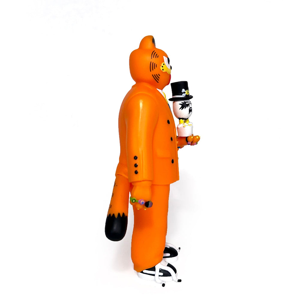 Side view of the Gangster Doodles GARF Vinyl Toy—a stylish orange cat holding a mini vinyl figure in black and white with a top hat—shown against a white background, from Gangster Doodles’ Gangster Doodles GARF Vinyl Toy & Cassette Tape set.