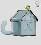The Ghost Cat Blind Box by Kaleidos Creative features a blue cat-themed house with a curled tail, transparent roof, and small green bird figure on top—a charming addition to any collection.