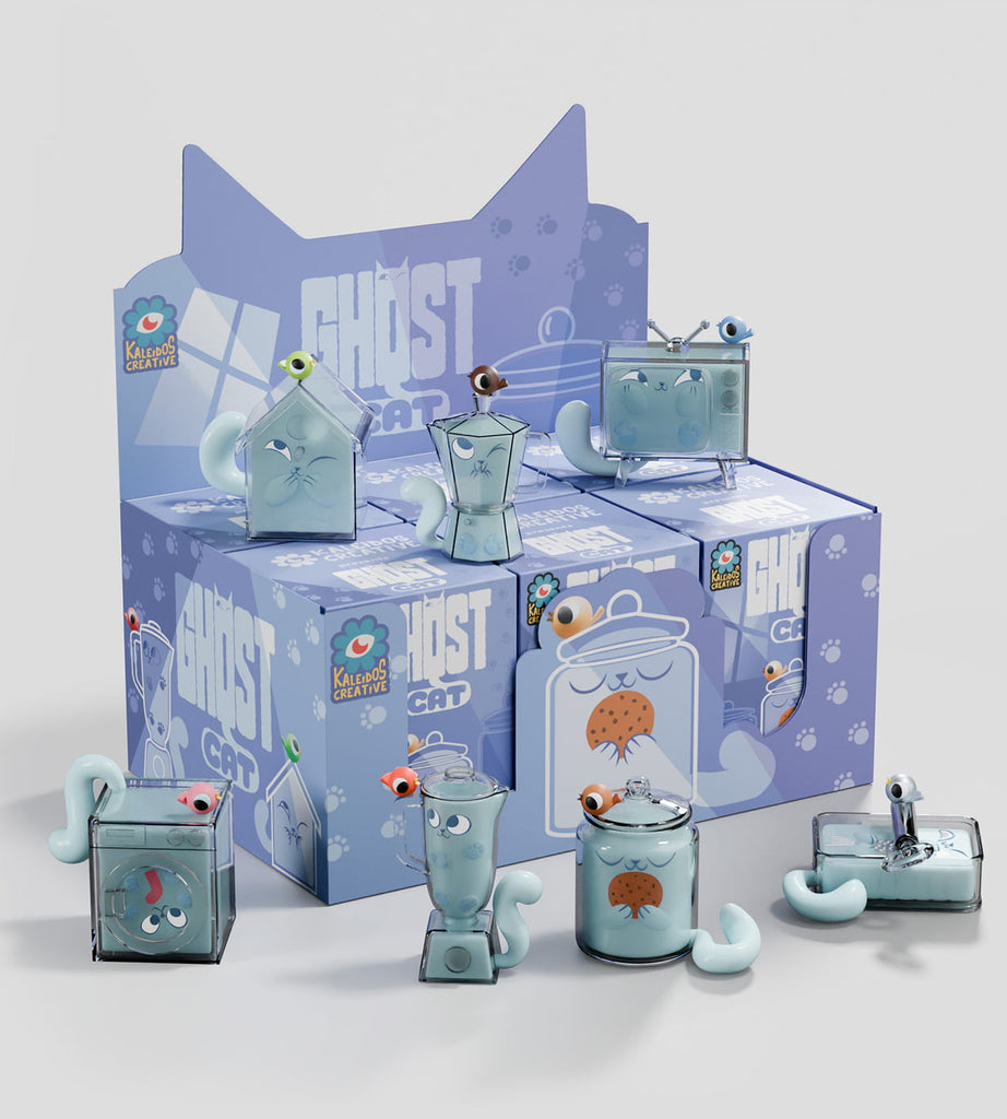 A lineup of blue cat-themed glass containers with tail handles and playful faces sits before a