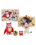 The Konatsuya 2026 Happy Set by Konatsuya features Japanese-themed figurines and items: an owl, two cats, a Negora figure, a button, a card with an owl and cat, and a wooden plaque with a samurai scene.
