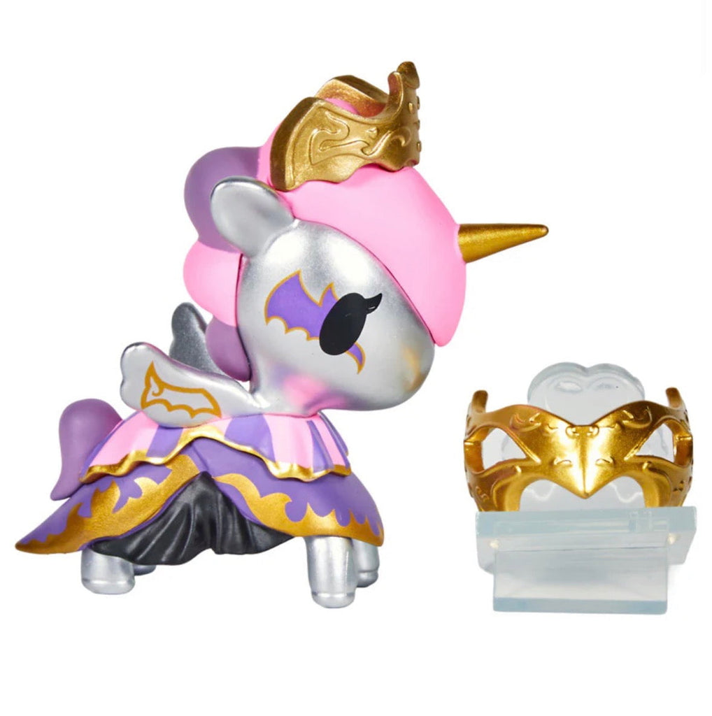 The Tokidoki Unicorno After Dark Masquerade Blind Box features a silver unicorn with a gold horn, pink and gold crown, purple and gold cape, and removable gold mask—perfect for any Blind Box surprise display.