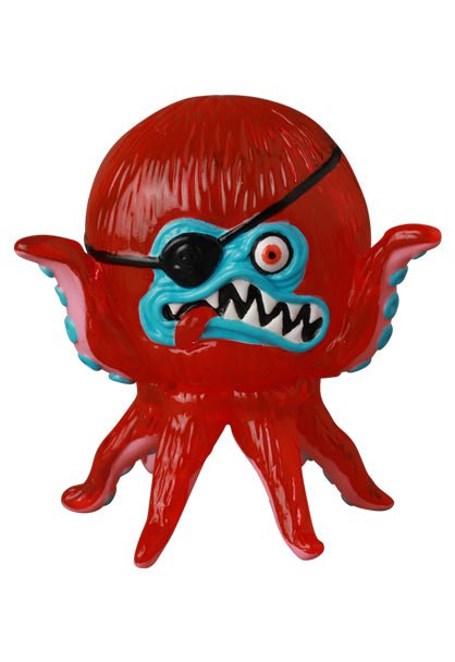 This Japanese vinyl toy, VAG 40 β AHOY by Shelterbank from Medicom (JP), features a red, octopus-like creature with an eyepatch and sharp teeth. Its unique design captures the quirky charm collectors often associate with Vinyl Artist Gacha and gachapon figures.