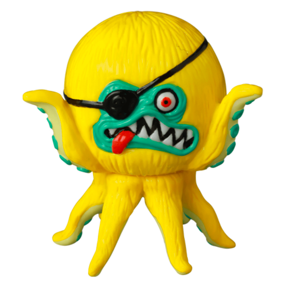 The VAG 40 β AHOY by Shelterbank, crafted by Medicom (JP), is a charming yellow toy octopus embodying the essence of Japanese vinyl toy design. It boasts a distinctive black eyepatch over one eye, a broad grin accentuated by sharp teeth, and a striking protruding red tongue. This piece makes for an enchanting addition to any gachapon figures collection!