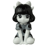 Introducing the VAG 40 β Zombiecats Story Morimeiworks Nekomusume by Medicom (JP), a black and white cartoon-style gachapon figure featuring a girl seated with large eyes, adorned in a polka-dot dress and a prominent bow on her head.