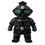 The VAG 40 — Tomodachi Zero Machine by Medicom (JP) is a gray toy robot with black accents and vivid green eyes, standing upright against a white background, reminiscent of an intricate Japanese vinyl toy from the Vinyl Artist Gacha collection.