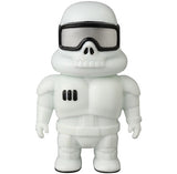 The Medicom (JP) VAG 45 — Space Controller is a white Japanese vinyl toy figure with a skull face, black visor, and black details standing upright.