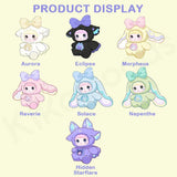Seven Nommi Fantasy World Plush Blind Box characters in hoods: Aurora, Eclipse, Morpheus, Reverie, Solace, Nepenthe, and Hidden Starflare.
