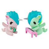 The Tokidoki Twinsies Unicorno Blind Box by tokidoki features two pastel unicorn figurines—one playing an accordion, the other a pink keyboard—perfect collectibles for any blind box fan.