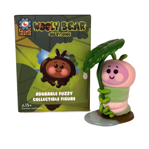 Add the adorable Wooly Bear and Friends Vinyl Blind Box from Kaleidos Creative to your collection—a fuzzy caterpillar figure with pink and green stripes holds a leaf umbrella, packaged in a charming blind box.