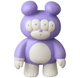 VAG 46 — Matthew by Medicom is a purple and white four-eyed bear figurine with round ears and a big white belly, inspired by Japanese vinyl toy design—ideal for Vinyl Artist Gacha or gachapon fans.
