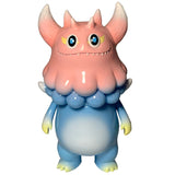 Rangeas Jr. - Light Blue/Pink by The Little Hut (HK) features a pastel monster with a pink horned head, blue body, yellow eyes, and small claws—an adorable collectible toy standing upright against a white background.