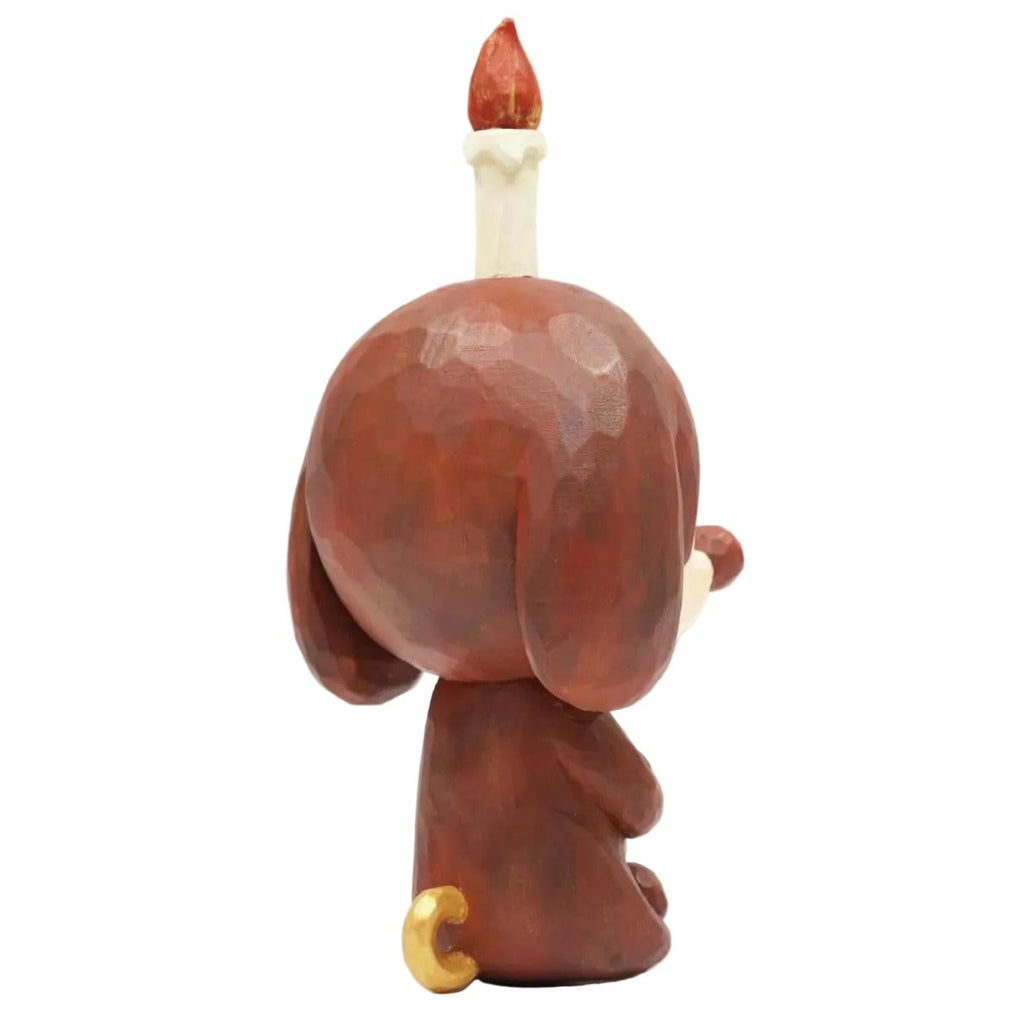 Keep Balance by How2Work (HK) shows a brown meditation pup figurine with a small golden tail seen from the back, featuring a candle with a red flame on its head.