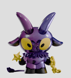 Meet Kid Krampus from Kaleidos Creative—a purple, horned blind box figure with big yellow eyes, holding a star wand and a yellow chain, ready to become your favorite holiday collectible.