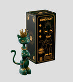 King Kat — Marble Majesty by Kaleidos Creative: A green and gold crowned cat figurine stands next to a matching