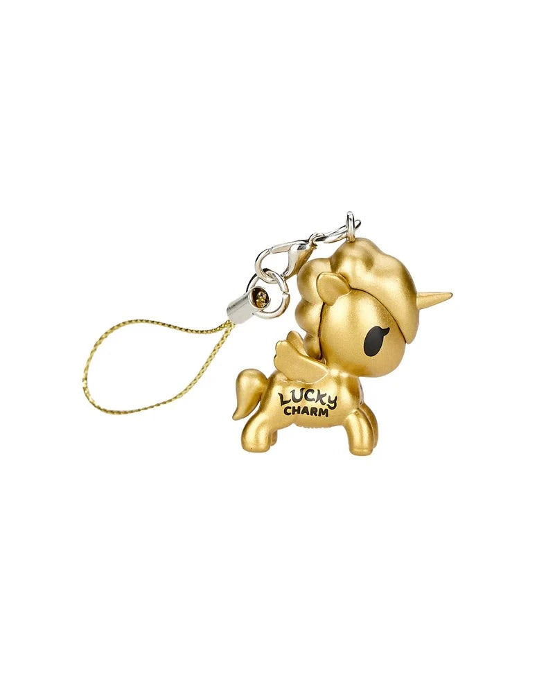 Add a touch of luck to your journey with Tokidoki's Lucky Unicorno Blind Box featuring a gold unicorn charm emblazoned with