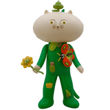 Meow Book - OG by The Little Hut (HK) is a cartoonish cat figurine with a quirky face, large head, green outfit, all-seeing flower in hand, and a red butterfly on its chest.