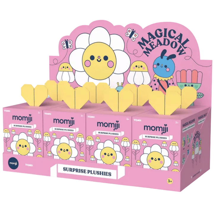 A pink display labeled “Magical Meadow” showcases multiple Momiji Magical Meadow Plush Blind Boxes, decorated with cartoon flowers and yellow chicks.