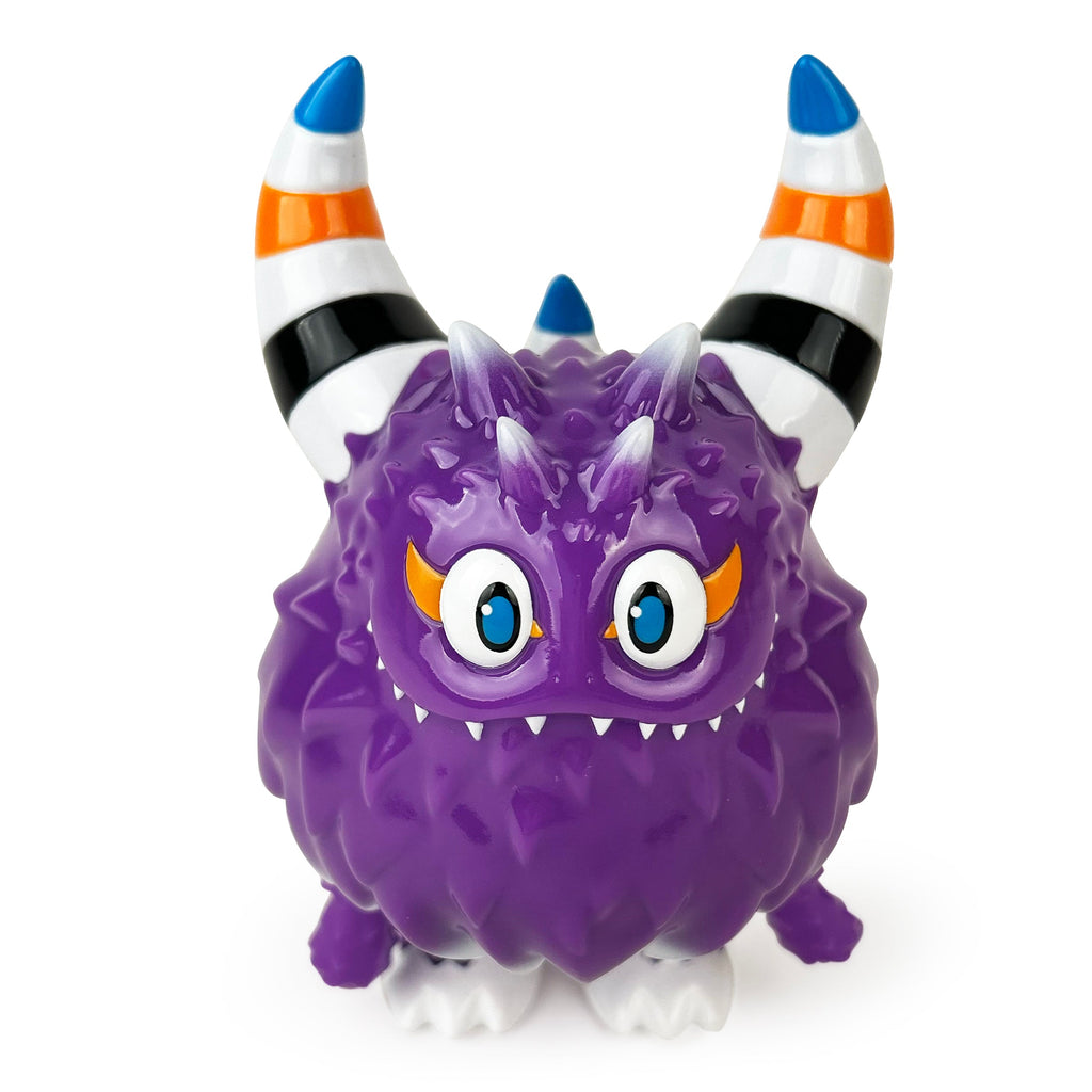 The Rangeas Rex Jr. — Lollipop Purple from The Little Hut (HK) is a small monster toy with orange eyes, a spiky texture, and striped horns.