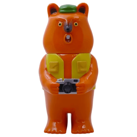 The Mamechan - #1 collectible figurine by Paradise Toy (TW) features an orange bear in a green hat and yellow vest holding a camera, displayed against a white background.