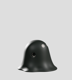 A rare, smooth black figure—Meyanmi Shadow by Kaleidos Creative—has two round holes and a small white spot. It sits against a plain light gray background, ready to be discovered in the Meyanmi Shadow Blind Box collection.