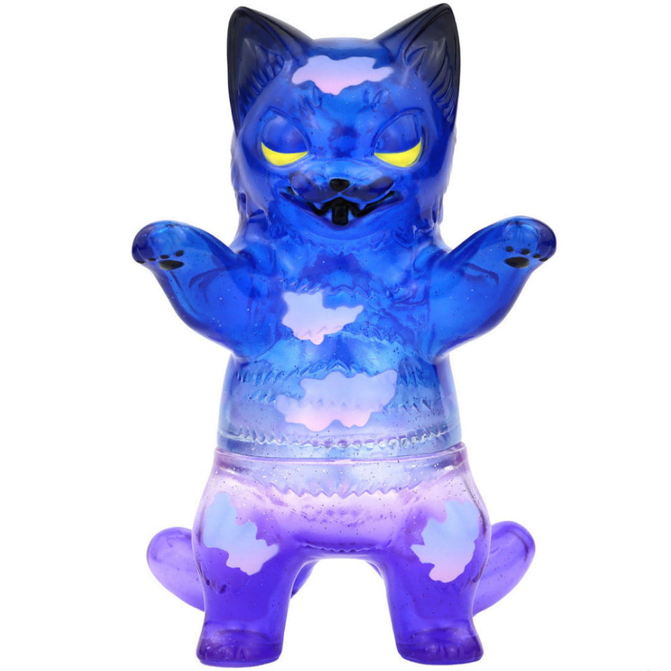 The Konatsuya Negora- Sky View Twilight is a translucent blue and purple vinyl cat toy with yellow eyes, outstretched arms, and a playful look—an eye-catching collectible perfect for your summer night display.