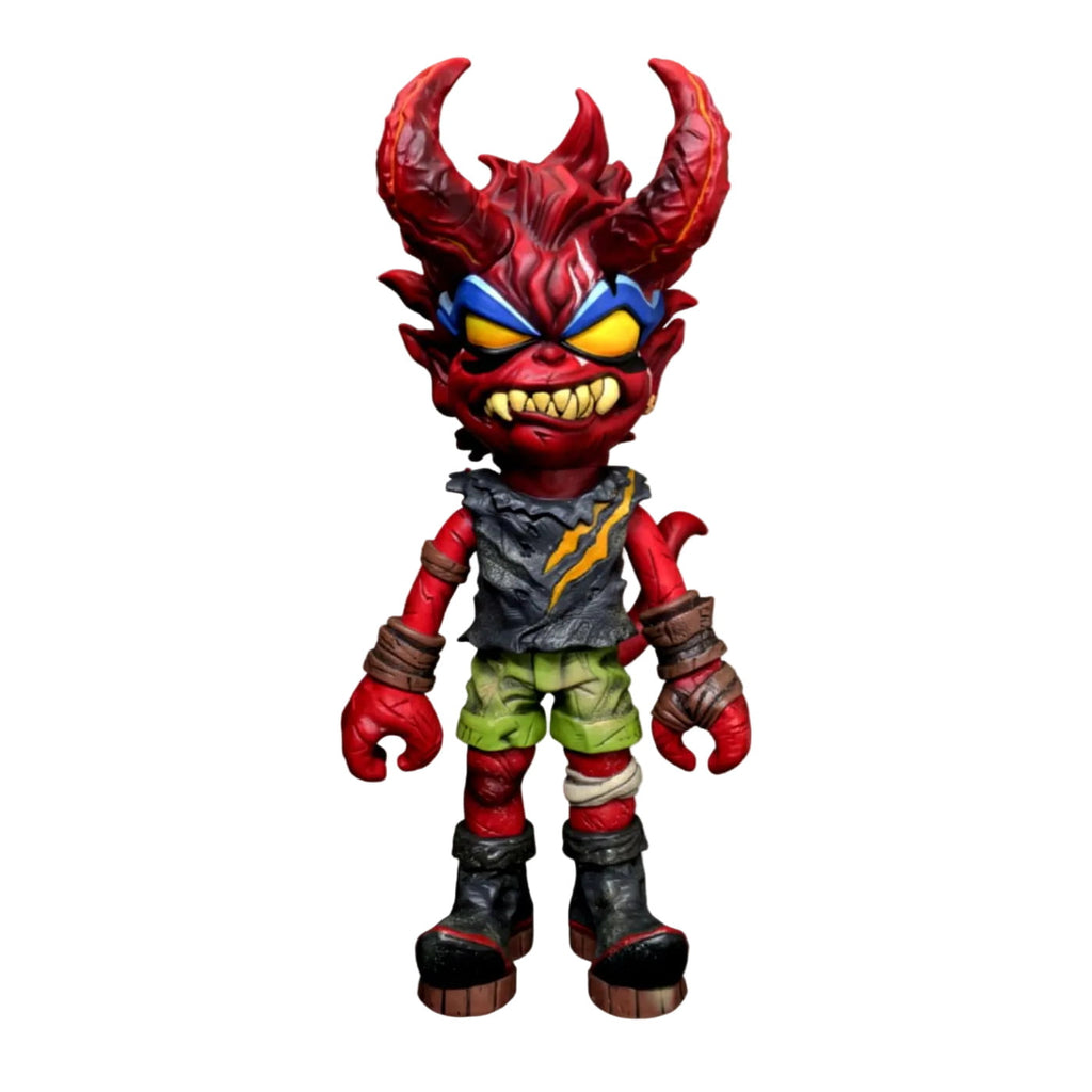 The Devil Warrior by AGCMT Creation Corp is a stylized red demon figurine with large horns, sharp teeth, blue goggles, torn shirt, green shorts, and black boots—ideal for collectible art trading card fans.