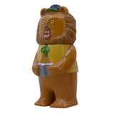 Morichan- Milktea by Paradise Toy is a plastic lion figurine in a milktea shade, with a yellow vest, green bow, black hat, and gray book. Stands upright on white background; perfect for collectors of Paradise Toy.