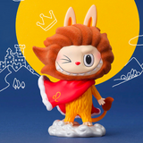 A Blind Box figure of a lion wearing a red cape from the Pop Mart Monsters - Constellation series Blind Box.