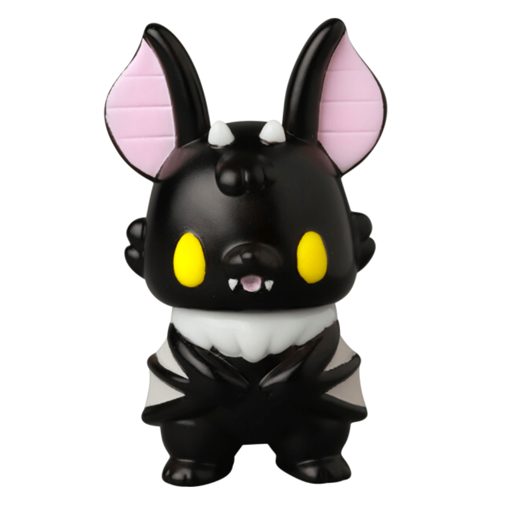 The VAG 10th Anniversary — Kopatapatan by Medicom (JP) is a cute black cartoon bat vinyl figure with pink ears, yellow eyes, and white fangs—perfect for Japanese gachapon collectors.
