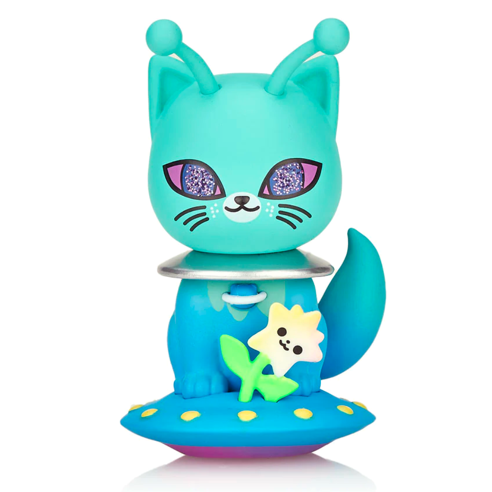 A blue toy cat from the tokidoki Galactic Cats Blind Box Series is perched on a flower.
