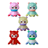 Five colorful, cartoonish VAG 10th Anniversary — Denshikodako vinyl figurines by Medicom (JP), each with a cape, are arranged in a V formation on a white background, highlighting the playful charm of Japanese toy design.