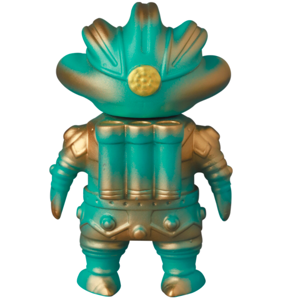 The VAG 34 - Tomodachi Second Machine by Medicom (JP) is a turquoise and gold humanoid toy figure seen from the back, with a helmet, armor, and backpack—an ancient machine radiating mystery and silent strength.