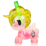 A transparent, pink Tokidoki Strawberry Matcha Unicorno with a yellow mane and a bubble tea pearls design on its flank.