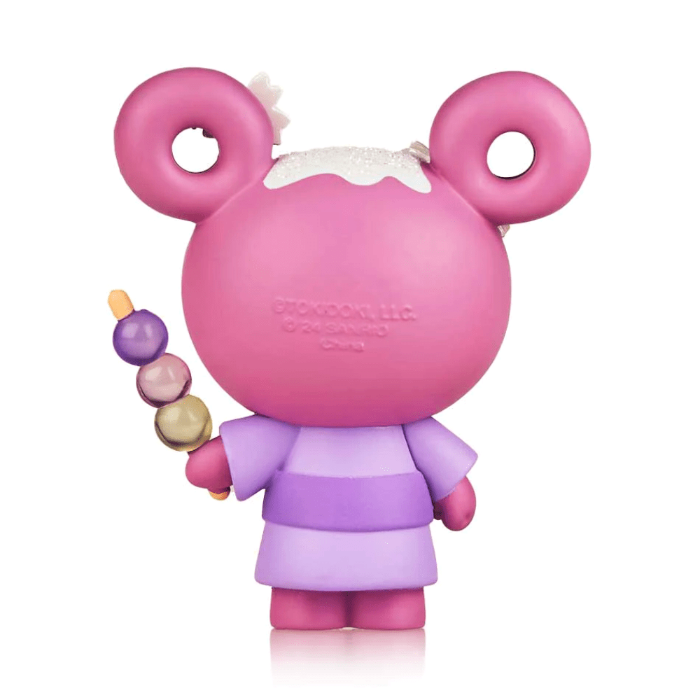 A pink tokidoki x Hello Kitty Series 3 (Limited Edition) vinyl toy bear with angel wings and a halo, holding an ice cream cone.