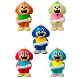 Five VAG 43 — Uluru vinyl figurines by Medicom (JP) stand upright, each colorful cartoon dog holding a different colored rolled towel, set against a plain white background.