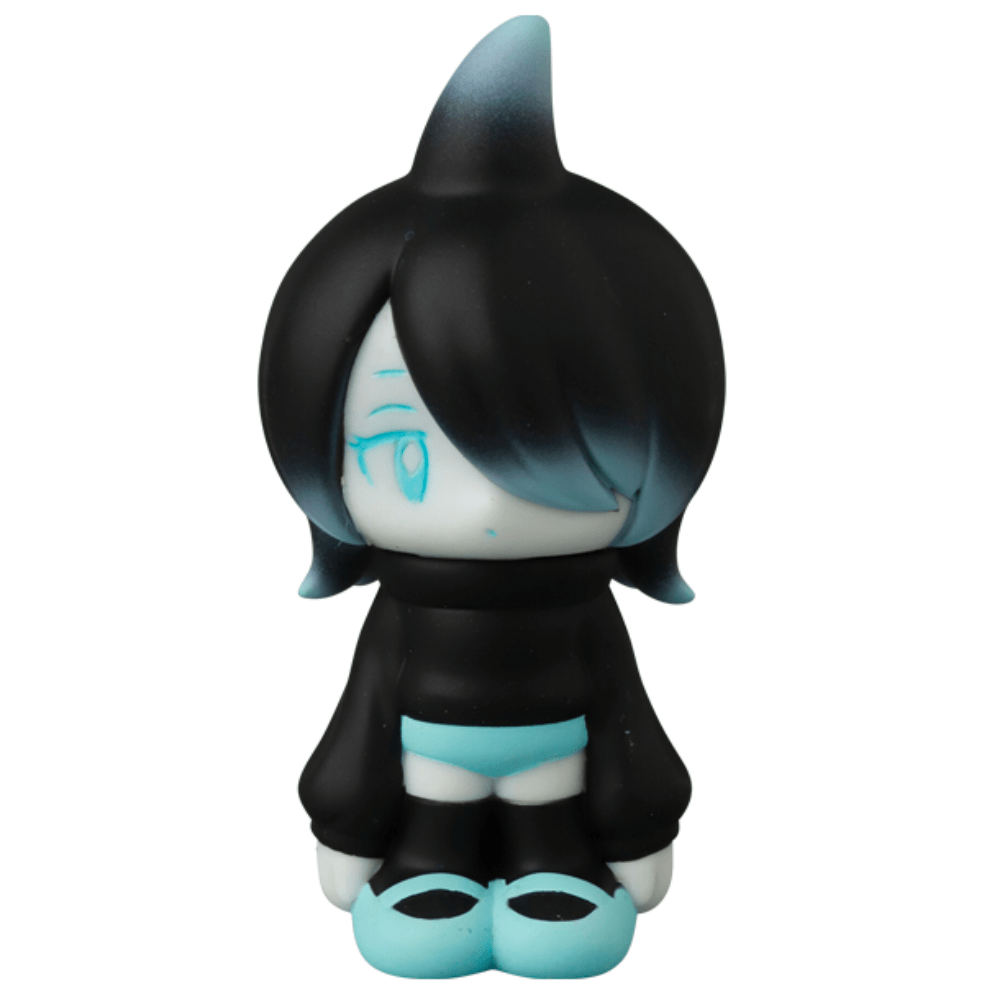 Medicom (JP) VAG 43 — Kae Chan V3 is a small Japanese vinyl toy featuring black and blue hair, a black hoodie, blue shorts, and blue shoes, standing upright with a neutral expression.