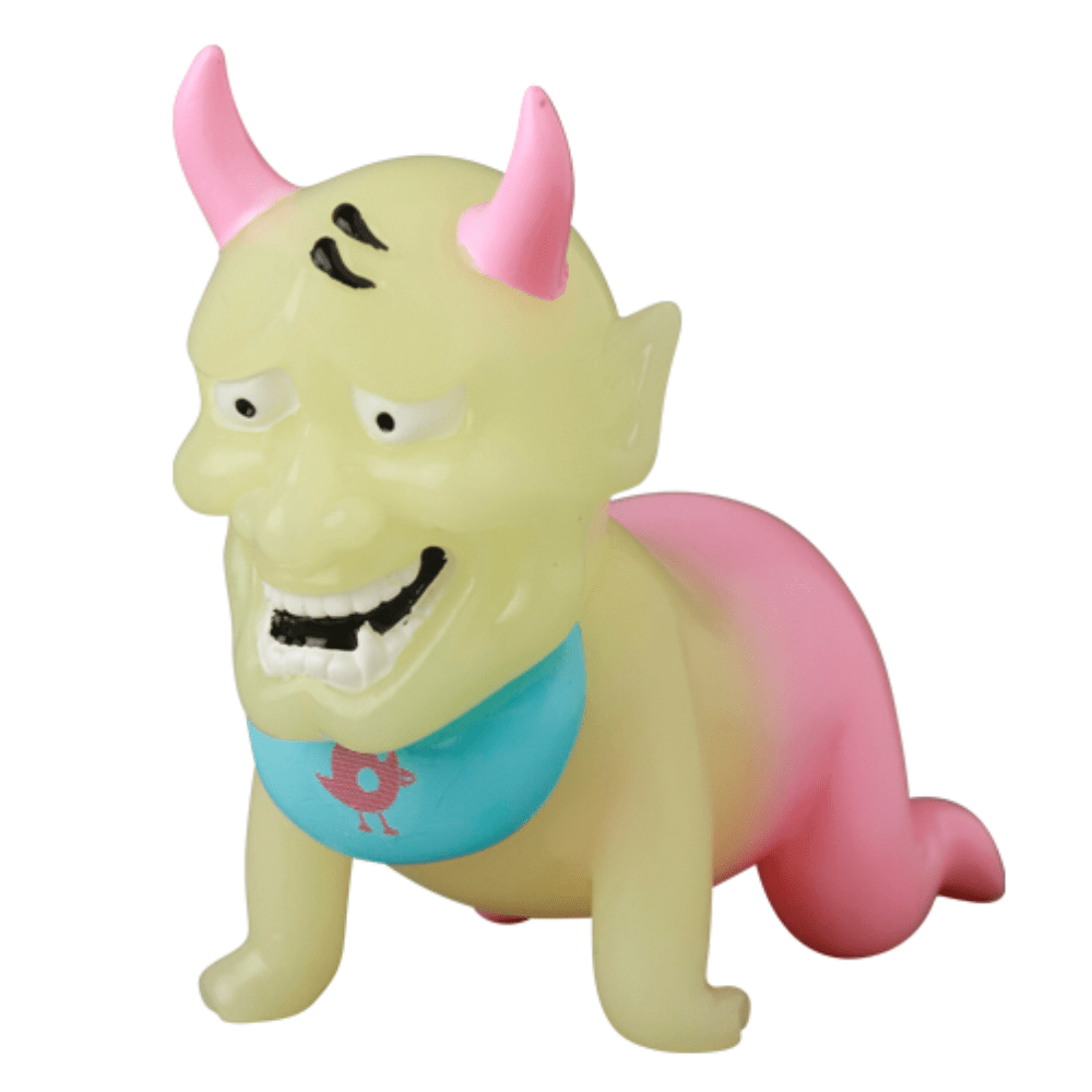 Celebrate VAG 10th Anniversary with Sebastian by Medicom (JP)—a yellow and pink horned creature figurine with a blue bib and playful features, ideal for fans of quirky Japanese vinyl and gachapon-inspired toys.
