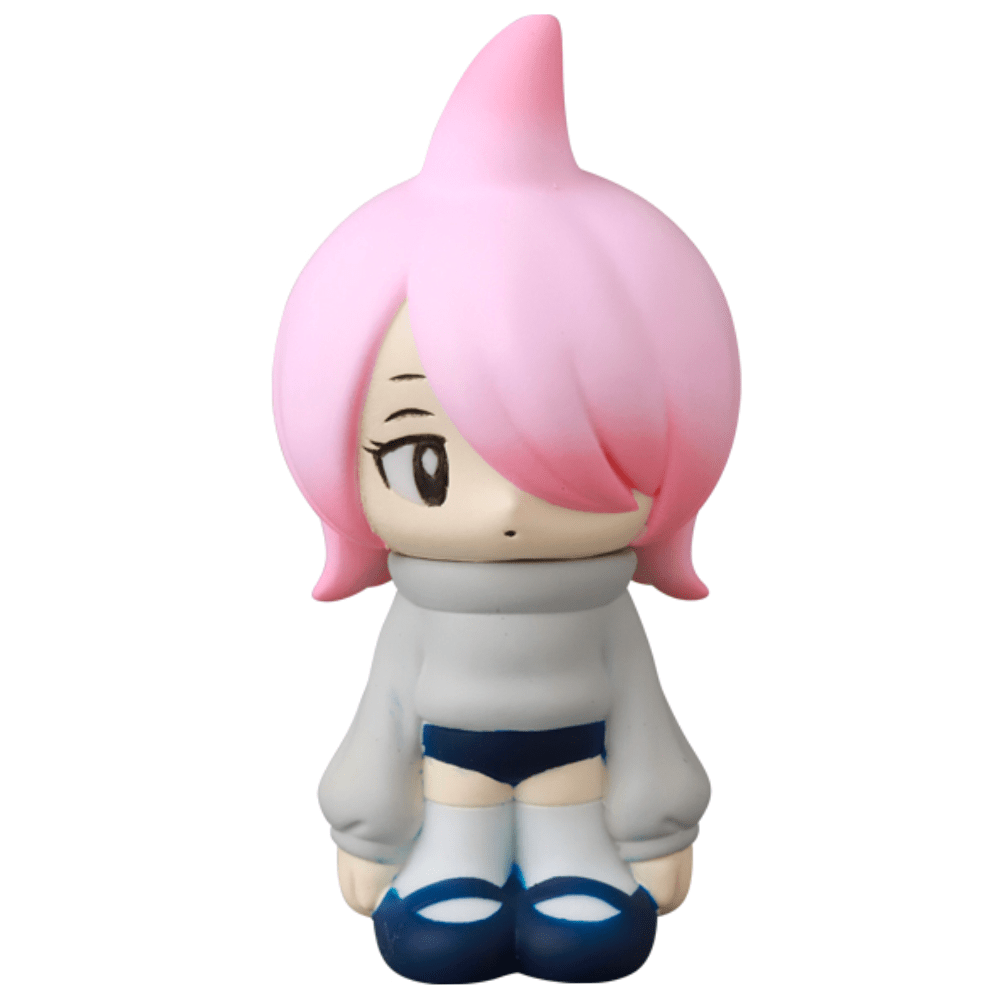 The VAG 43 — Kae Chan V3 by Medicom (JP) is a small gachapon figure of a pink-haired character in an oversized gray sweater, dark shorts, and blue shoes, posed against a white background.