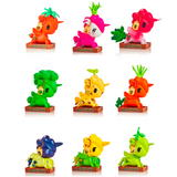 Collection of nine colorful tokidoki Veggie Unicorno Blind Box figures, each uniquely designed with different facial expressions and holding playful accessories, standing on individual platforms.