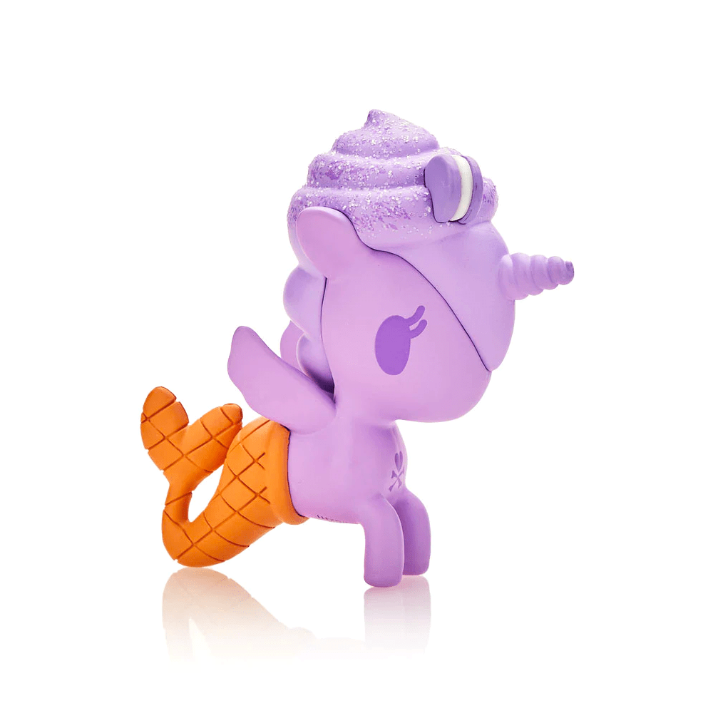 A purple Frozen Treats Unicorno Blind Box toy by tokidoki on a white surface.