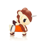 A Frozen Treats Unicorno Blind Box toy with horns on a white background by tokidoki (IT).