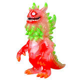 The Medicom (JP) VAG 10th Anniversary — Rangeas is a colorful Japanese vinyl toy monster with a translucent red, green, and orange body, spiky back, big eyes, sharp teeth, and claws. Ideal for gachapon figure collectors.