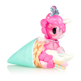 A tokidoki Limited Edition pink teddy bear perched on an ice cream cone.